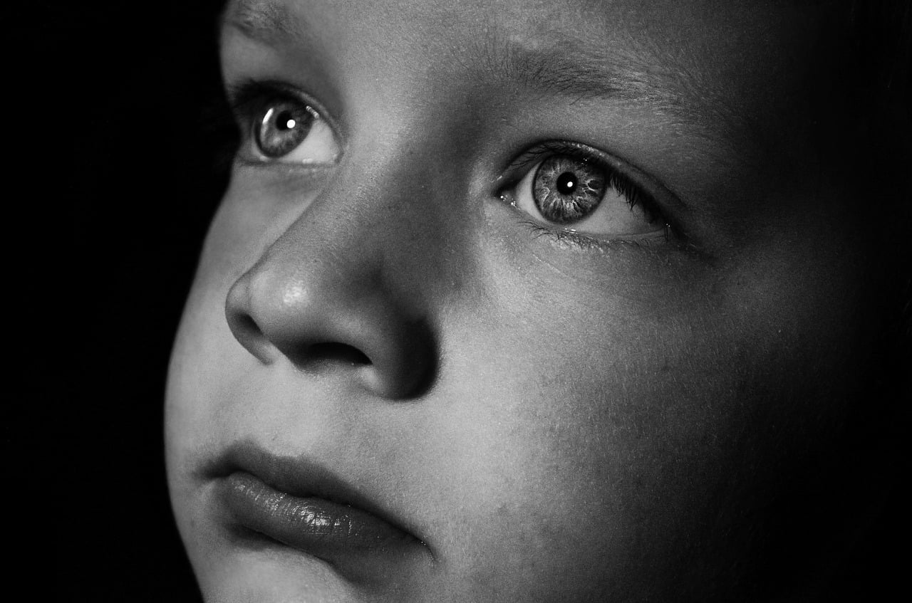 Young-boy-looking-sad
