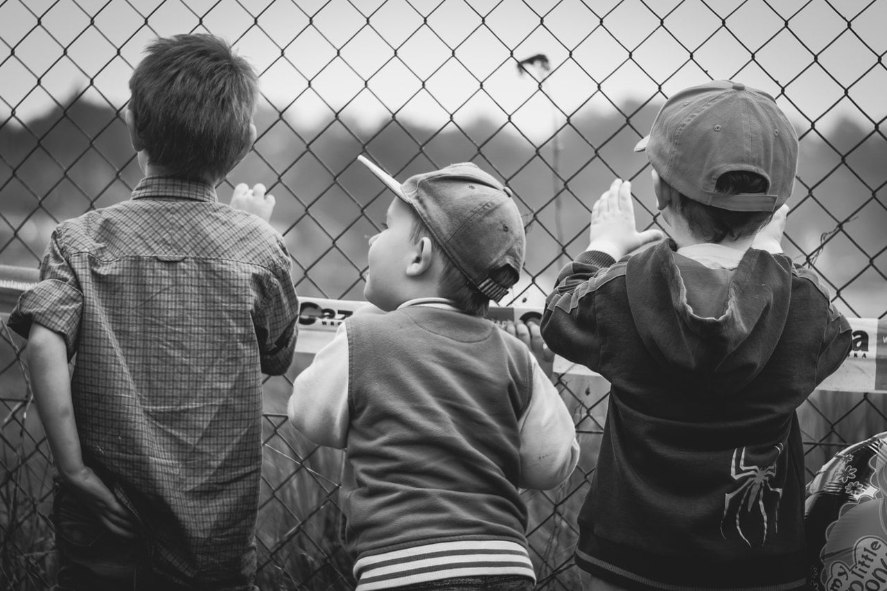 Black and white image of three children