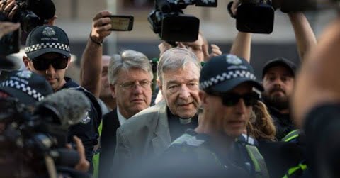 George Pell with police