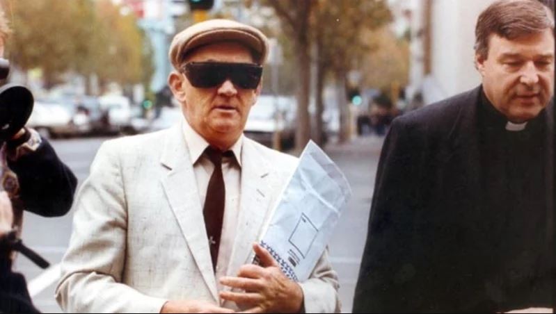 Gerald Ridsdale heading off to court with George Pell