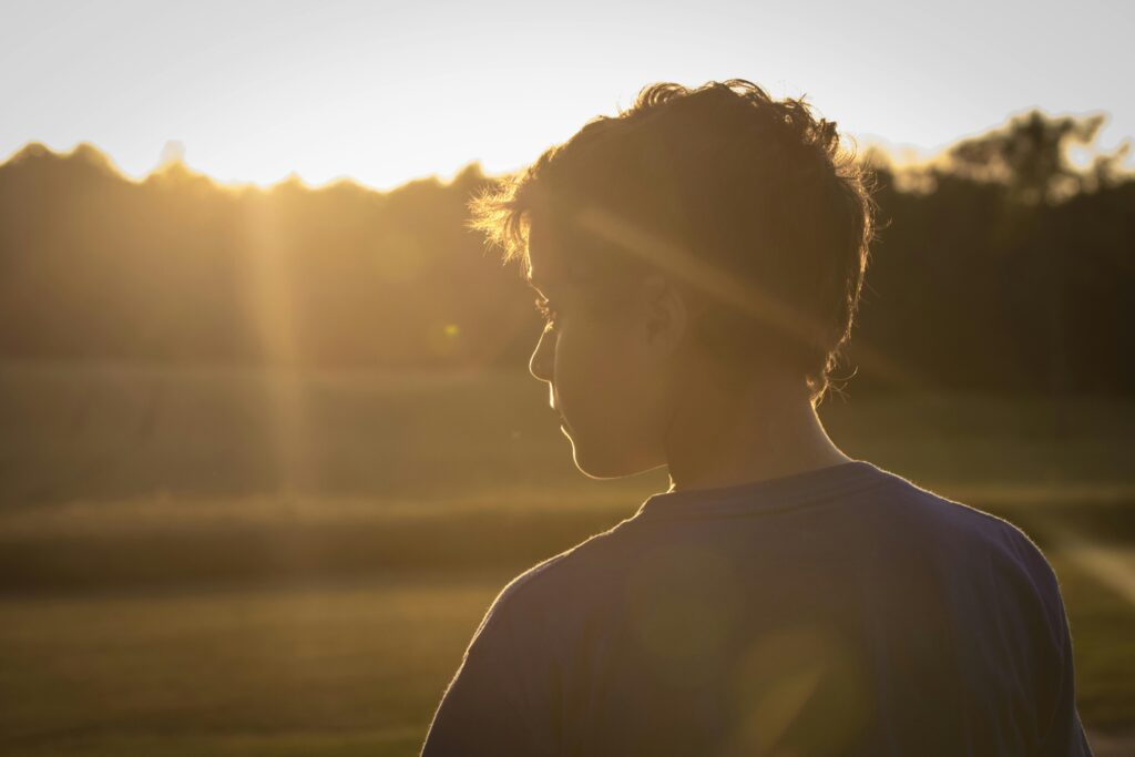 sad boy in the sunshine