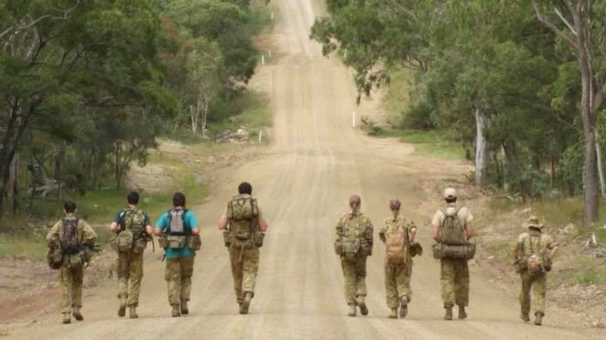 Australian troops walking in the outback 