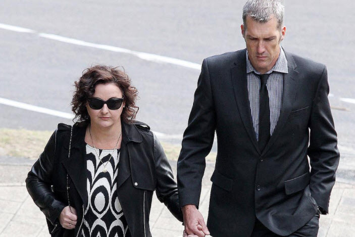 Michael Goodwin and his wife attending court