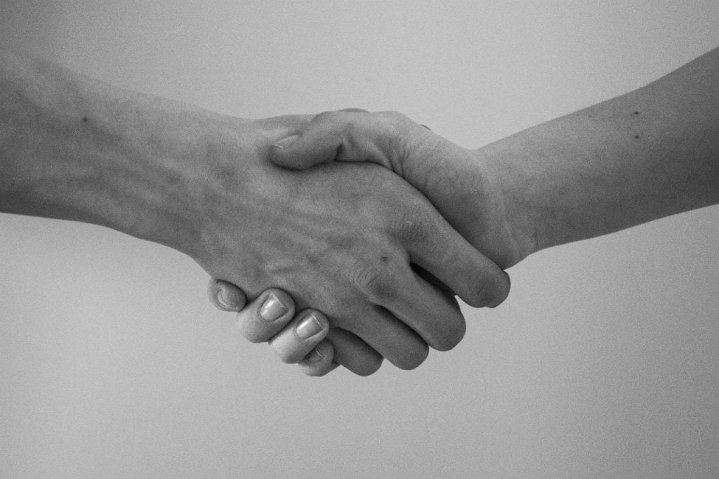 Two hands joined