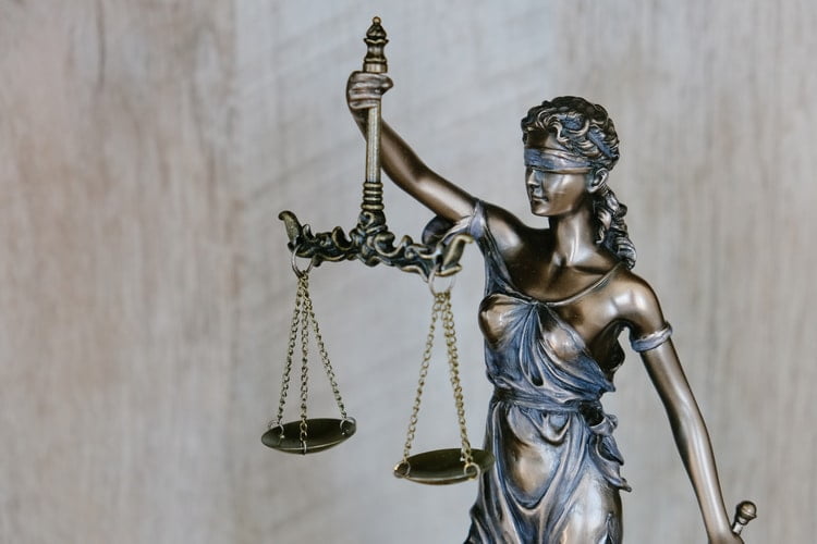 statue of justice for child abuse survivors