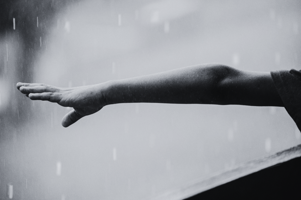 boy reaching out